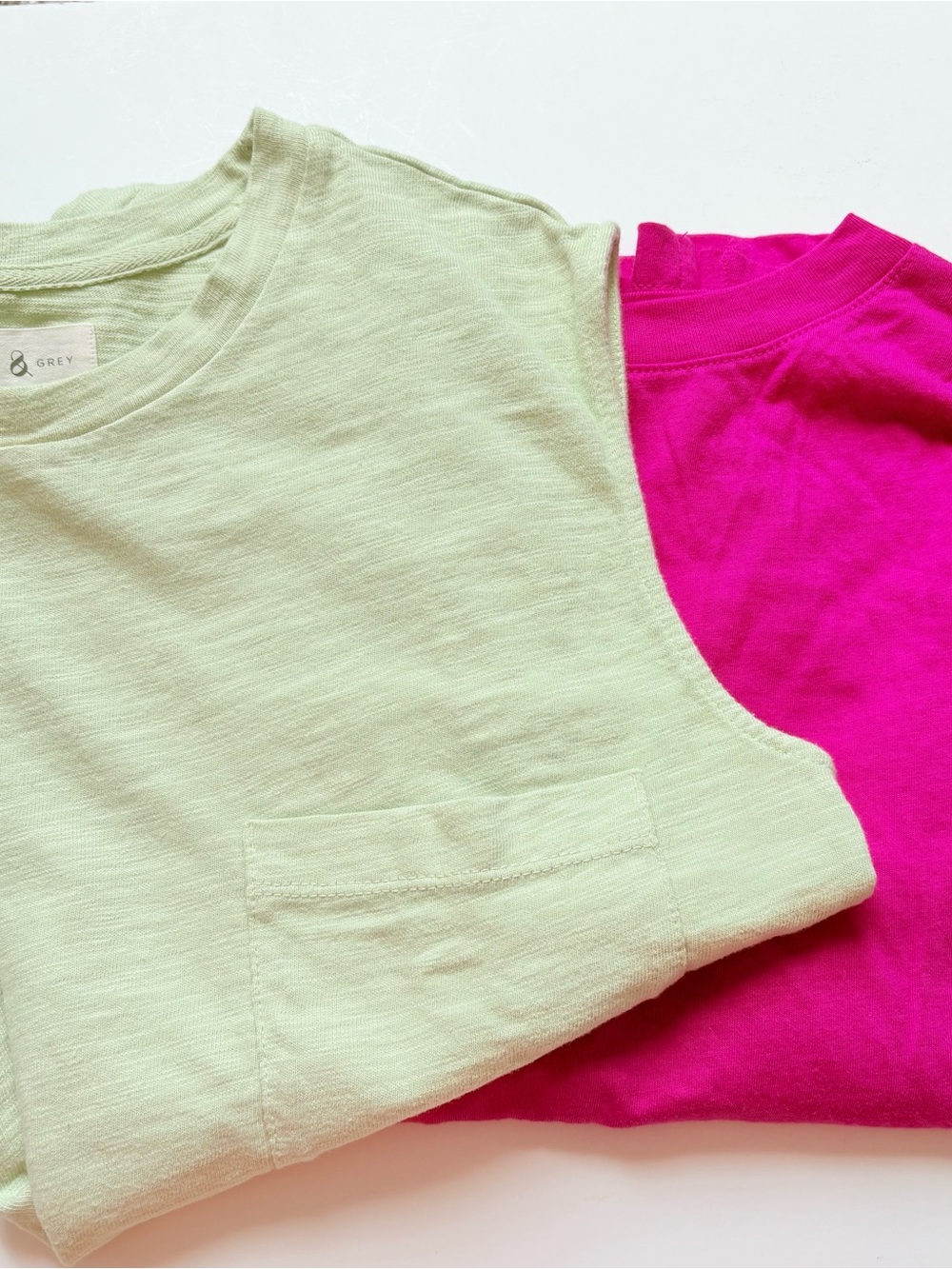 Set of Two Green and Pink Sleeveless Athletic Tops